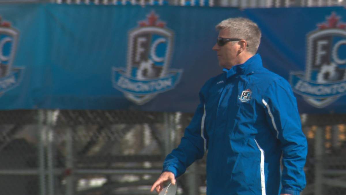 FC Edmonton head coach Colin Miller looks on at practice on Wednesday, April 5.