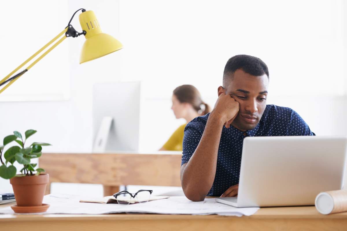 Employee working at his desk.
