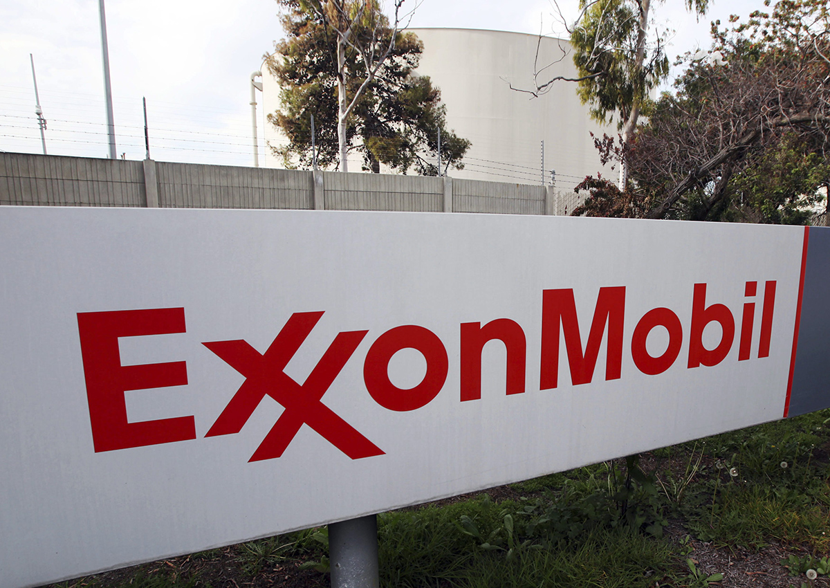 This Jan. 30, 2012, file photo, shows the sign for the Exxon Mobil Torrance Refinery in Torrance, Calif. 