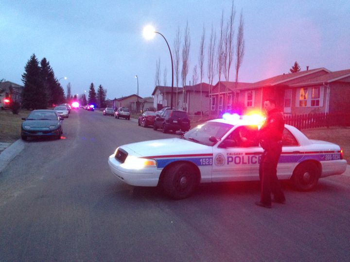 Police cordon off a portion of Fulton Close N.E. after reports of a shooting. 
