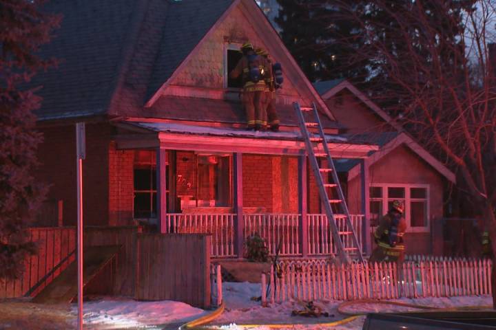 Calgary firefighters battle a fire in the 700 block of McDougall Road N.E. on Wednesday, Feb. 22, 2017.