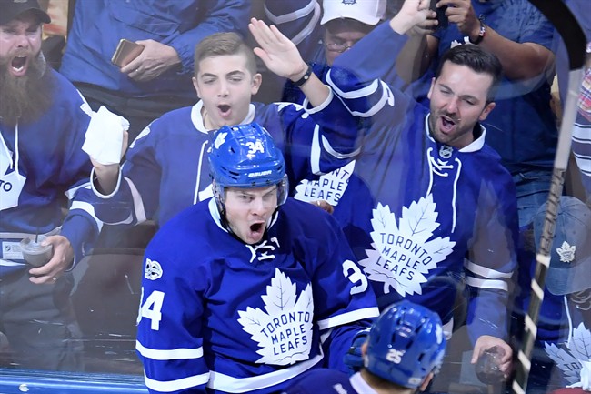 Toronto Maple Leafs centre Auston Matthews (34) celebrates after scoring against the Washington Capitals during the third period of game six in an NHL Stanley Cup hockey first-round playoff series in Toronto on Sunday, April 23, 2017.