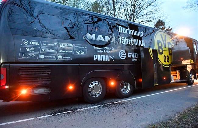 A window of Dortmund\’s team bus is damaged after an explosion before the Champions League quarterfinal soccer match between Borussia Dortmund and AS Monaco in Dortmund, western Germany, Tuesday, April 11, 2017.