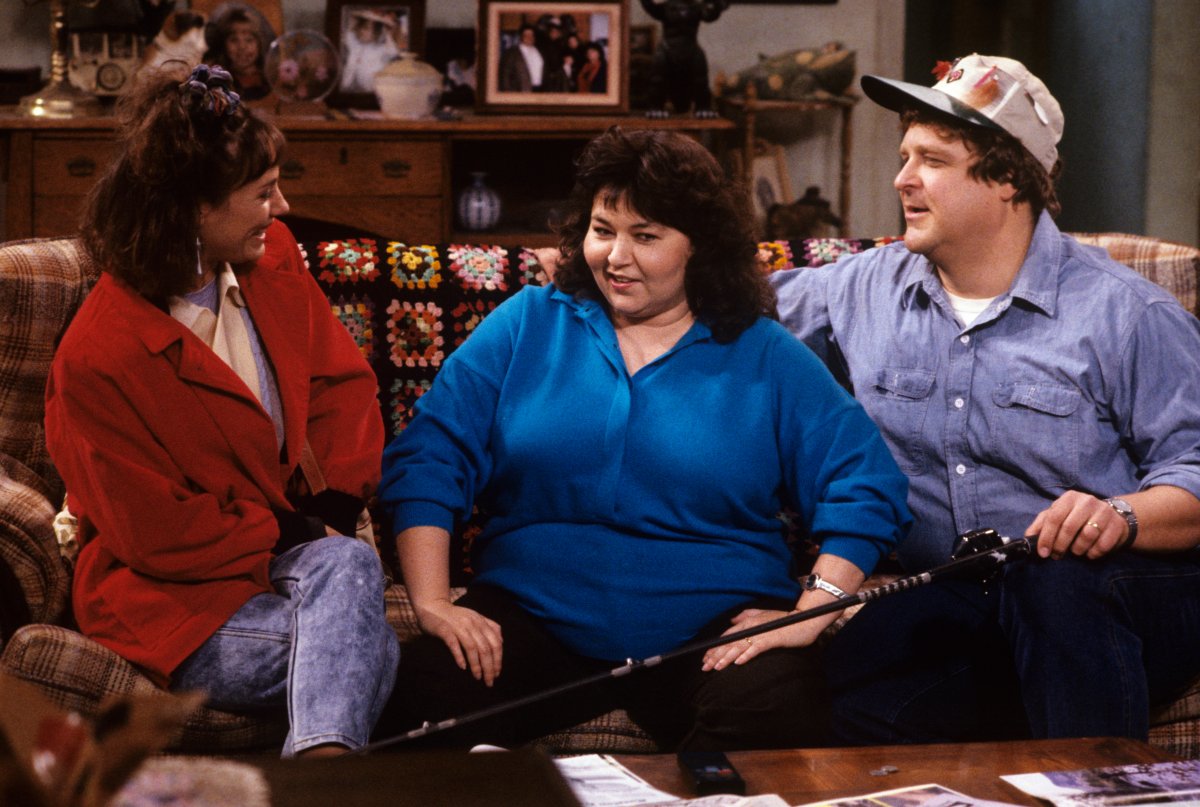 Laurie Metcalf, Roseanne Barr, John Goodman on the set of 'Roseanne.'.
