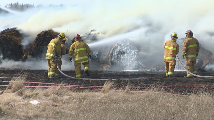 Crews are working to contain a big fire burning up hay bales in southeast Regina, near the Wascana Golf Course.