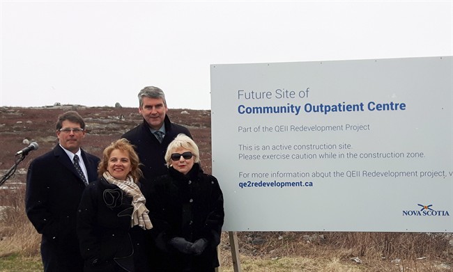 Nova Scotia Premier Stephen McNeil (back) and government officials pose in Halifax, Thursday, April 20, 2017 after announcing the new QEII outpatient clinic in Bayers Lake.