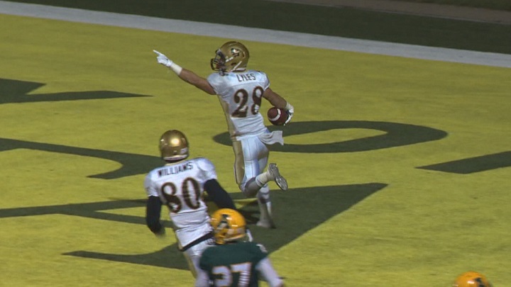 Manitoba Bisons returner Jamel Lyles celebrates a touchdown against the Alberta Golden Bears in 2015.