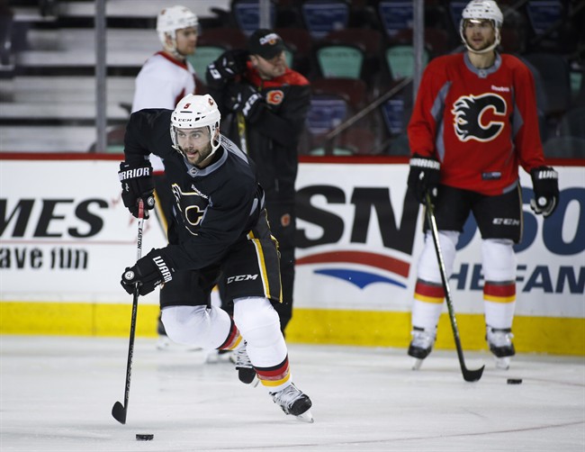 Calgary Flames' Mark Giordano skates during a team practice in Calgary, Monday, April 10, 2017.