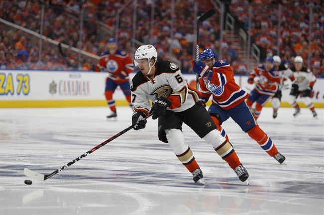 Anaheim Ducks centre Rickard Rakell (67) moves in on a breakaway to score the game's first goal against the Edmonton Oilers during first period NHL hockey round two playoff action in Edmonton, Sunday, April 30, 2017.