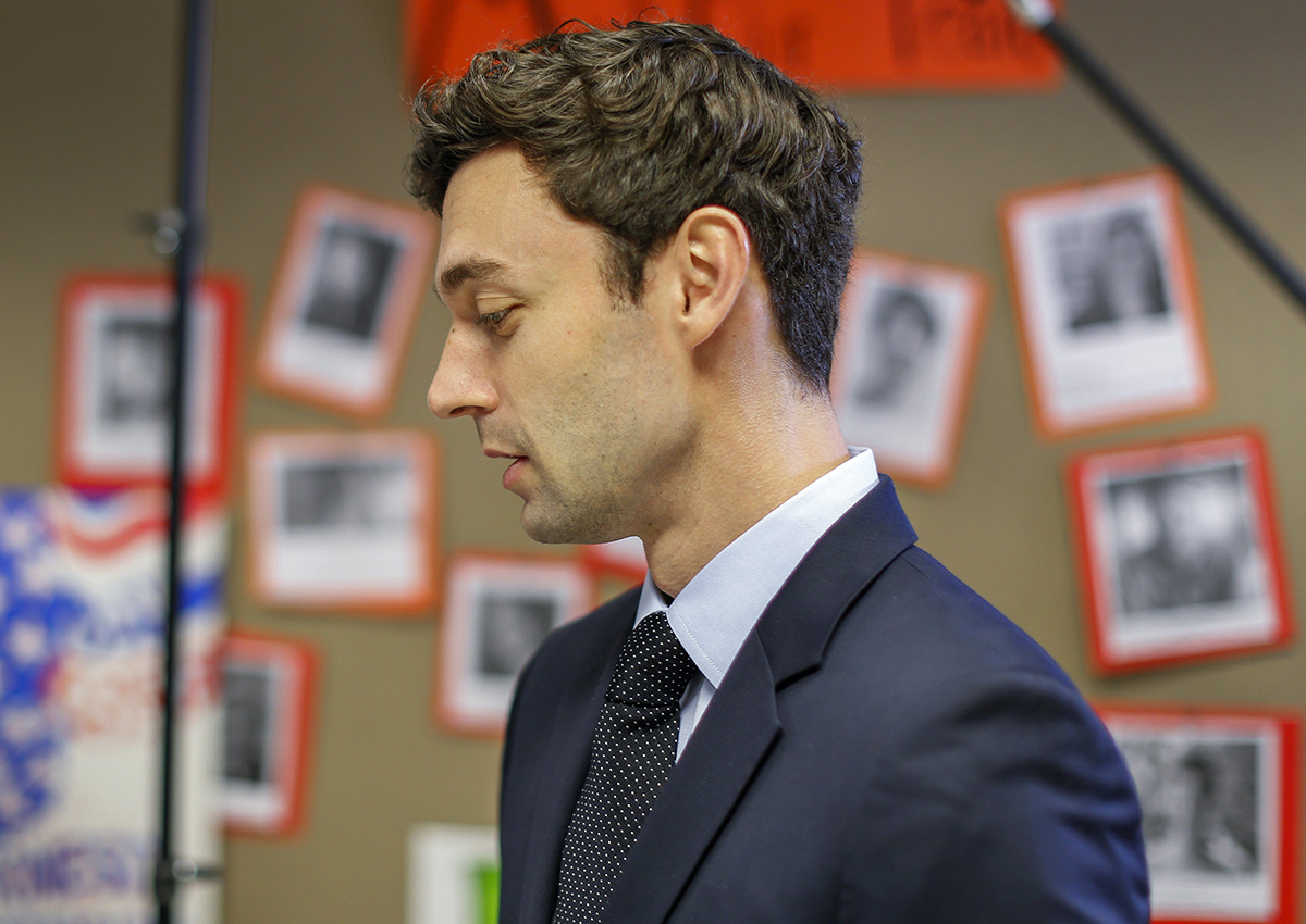 Jon Ossoff speaks with volunteers on the morning of the special election at campaign office in Atlanta, Georgia.