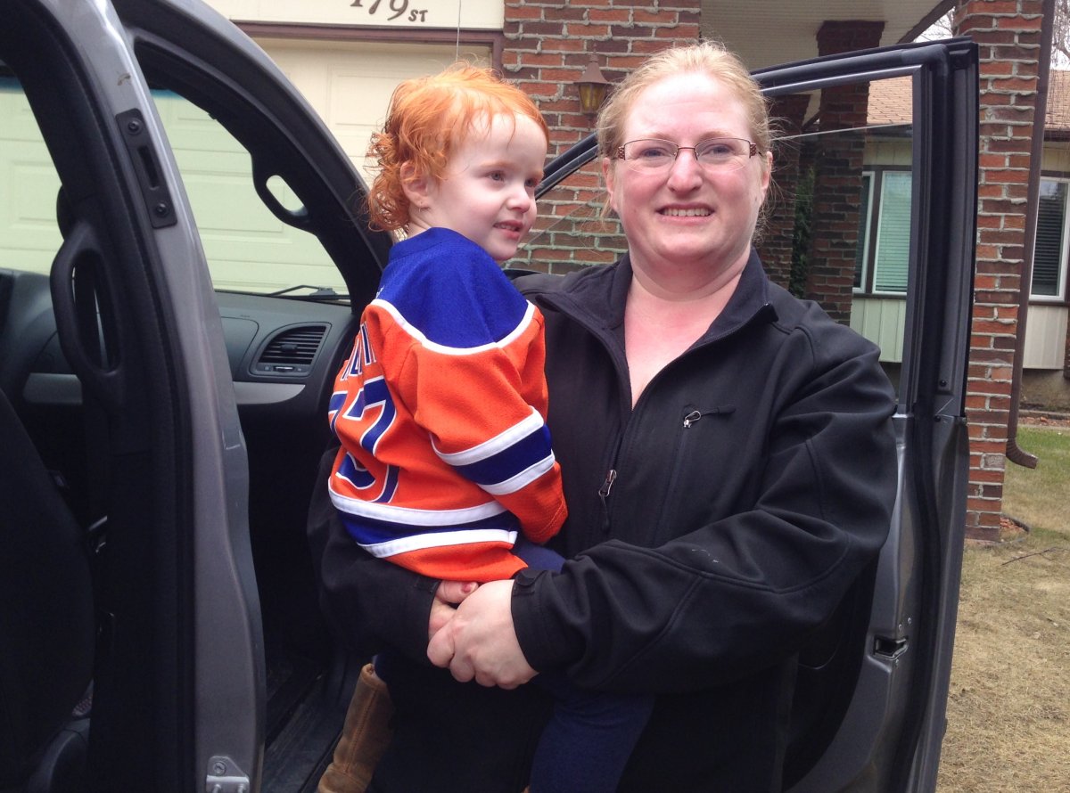 Oilers fan Lucy Kapelsky had a late night - and an early morning, waking up with daughter Stella.