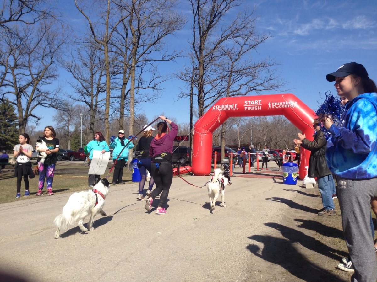 80 dogs and hundreds of people joined in on Sunday's fun run at St. Vital Park. 