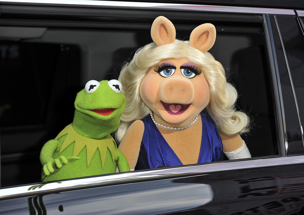 In this March 11, 2014, file photo, Kermit the Frog, left, and Miss Piggy arrive at the World Premiere of "Muppets Most Wanted," in Los Angeles. 