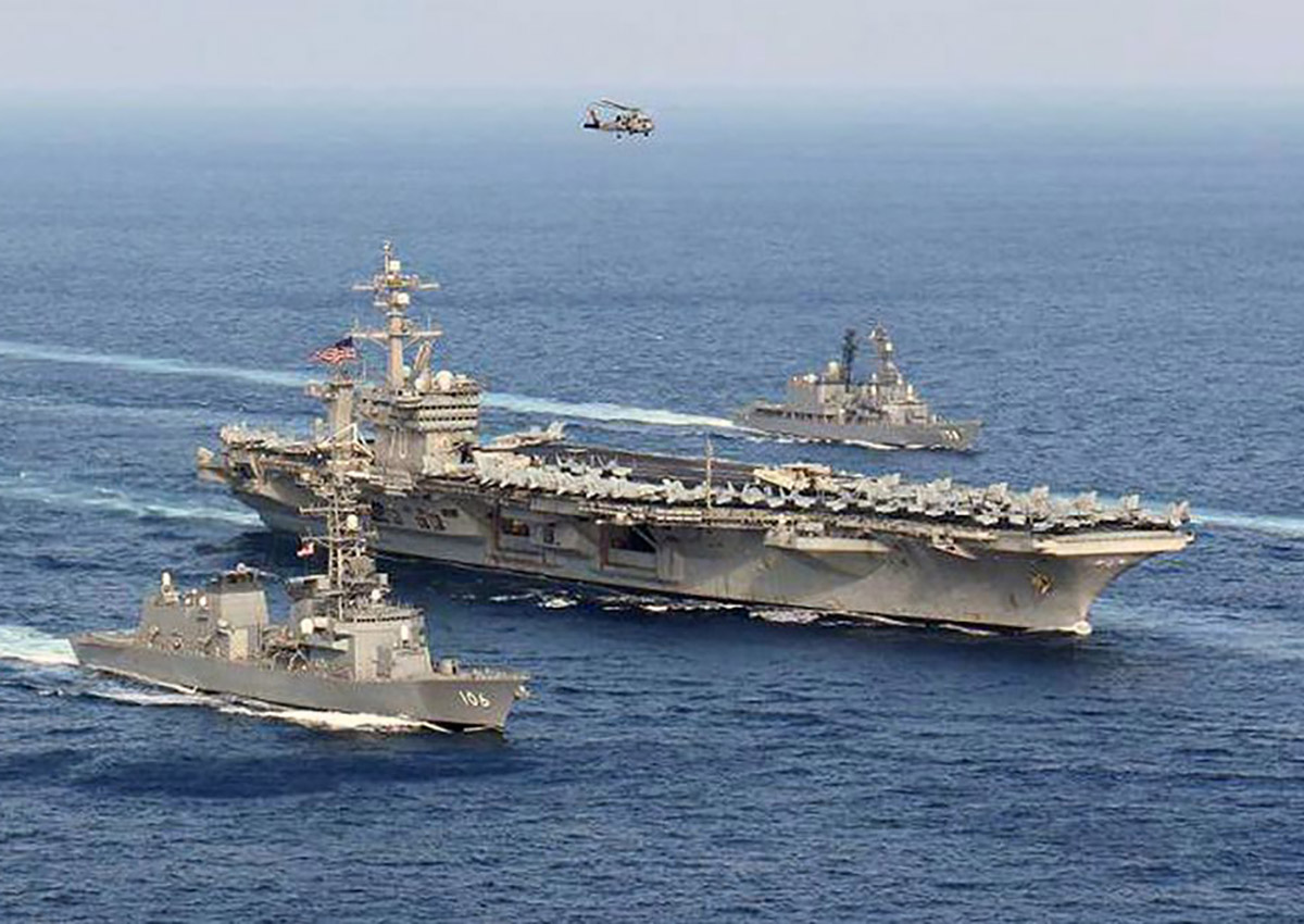 USS Carl Vinson (CVN 70) and Japan Maritime Self-Defense Force (JMSDF) ships steam in formation at the conclusion of a bilateral exercise to increase proficiency in basic maritime skills and improve response capabilities, Mar. 29, 2017. 