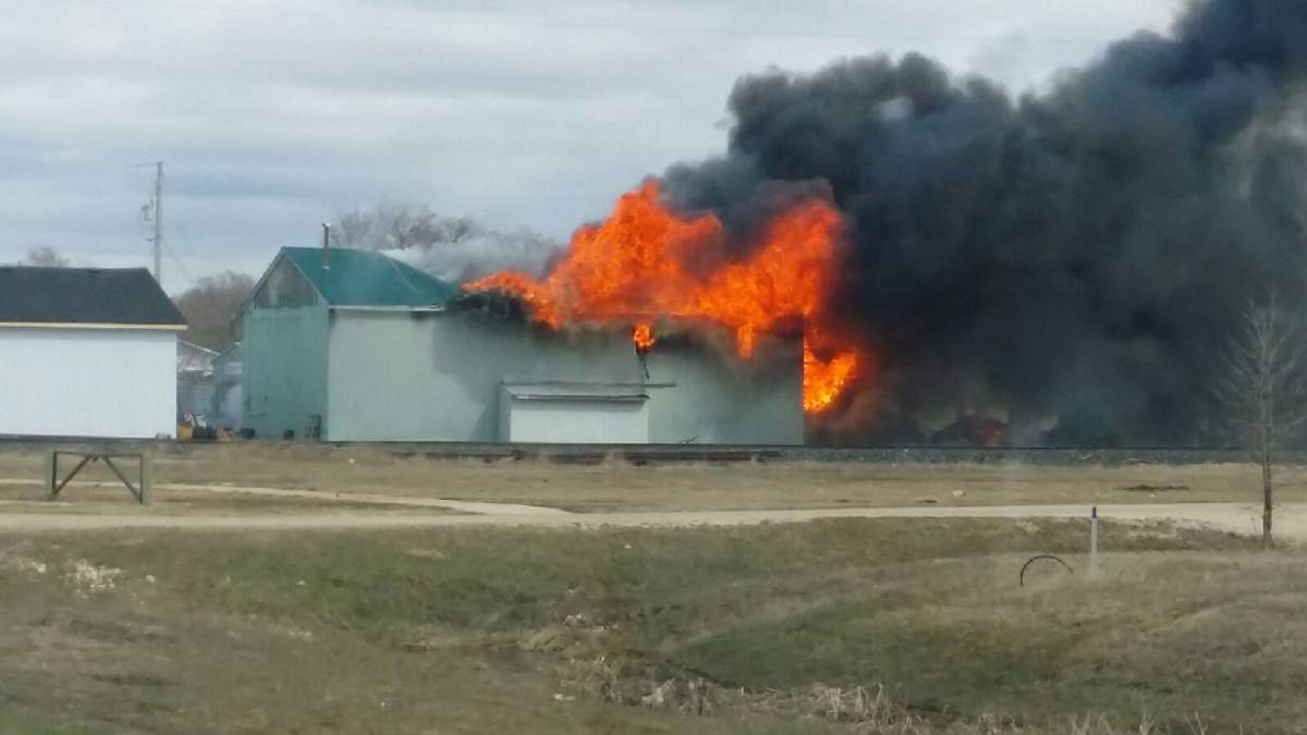 Fire tears through a warehouse in Niverville, Manitoba.