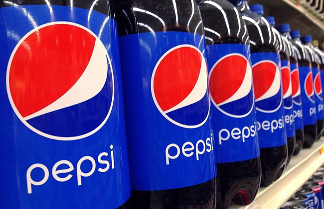 FILE - In this July 9, 2015, file photo, Pepsi bottles are on display at a supermarket in Haverhill, Mass.