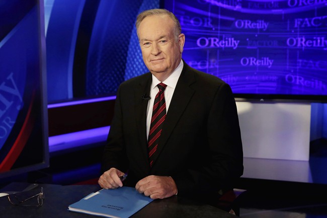 In this Oct. 1, 2015 file photo, host Bill O'Reilly of "The O'Reilly Factor" on the Fox News Channel, poses for photos in the set in New York. 