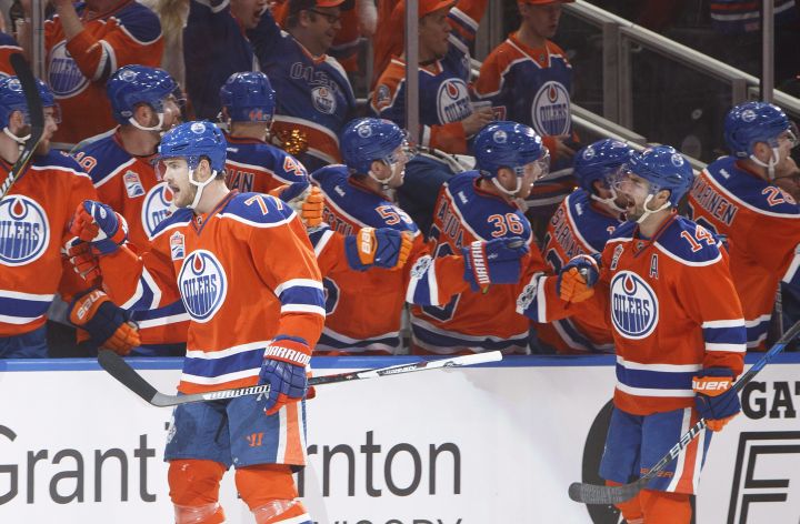 Edmonton Oilers' Oscar Klefbom (77) and Jordan Eberle (14) celebrate a goal during first period NHL playoff action against the San Jose Sharks, in Edmonton, Alta., on Wednesday, April 12, 2017.