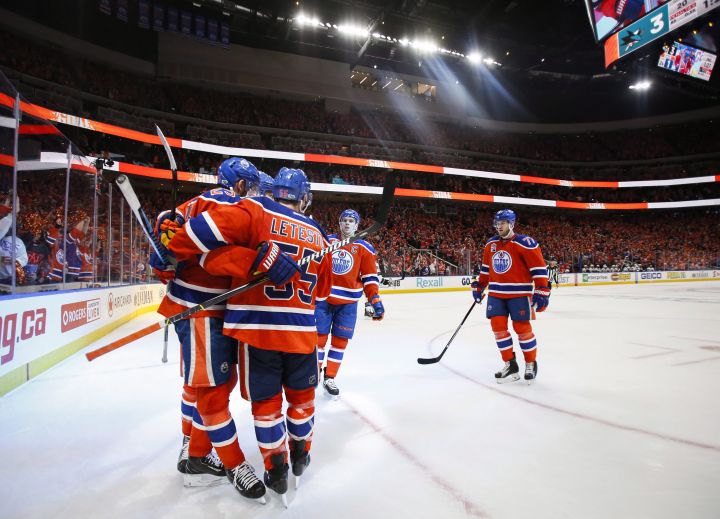 Edmonton Oilers' Mark Letestu (55) celebrates his goal with teammates during second period NHL hockey round one playoff action against the San Jose Sharks, in Edmonton, Thursday, April 20, 2017. 
