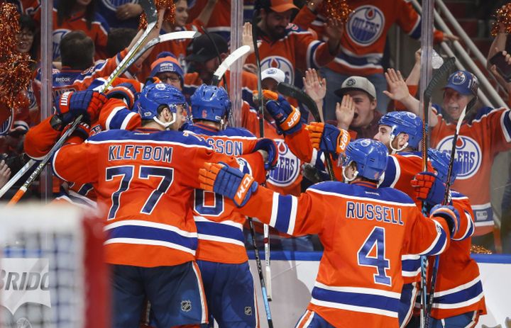 Edmonton Oilers celebrate their win following overtime NHL hockey round one playoff action against the San Jose Sharks, in Edmonton, Thursday, April 20, 2017. 