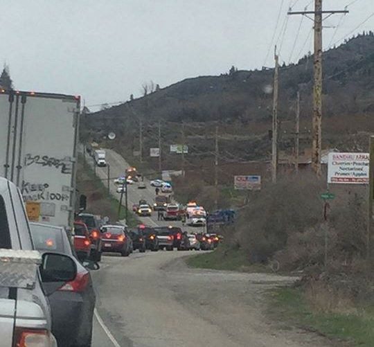 RCMP remain at the scene of a three car crash in Osoyoos. Traffic is backed up in both directions.