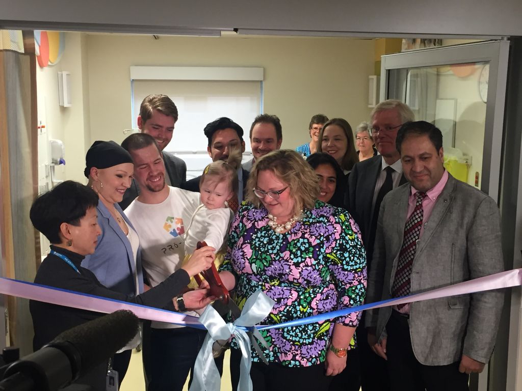 Alberta Health Minister Sarah Hoffman cuts the ribbon at the new NICU at the Peter Lougheed Centre.