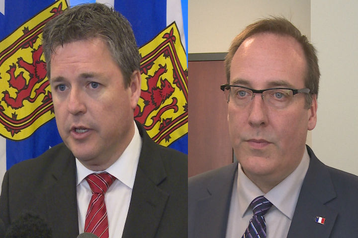 Progressive Conservative MLA Chris d'Entremont, right, is calling on Acadian Affairs Minister Michel Samson to step aside in the electoral map dispute. Samson says he will not. 