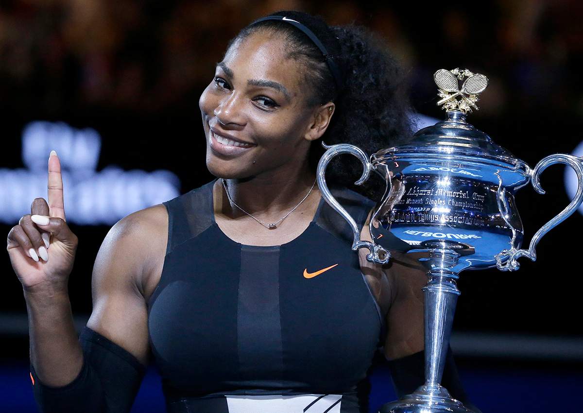 - In this Jan. 28, 2017, file photo, Serena Williams holds up a finger and her trophy after defeating her sister, Venus, in the women's singles final at the Australian Open tennis championships in Melbourne, Australia. 