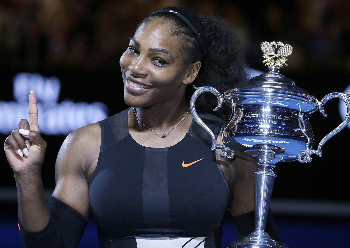 - In this Jan. 28, 2017, file photo, Serena Williams holds up a finger and her trophy after defeating her sister, Venus, in the women's singles final at the Australian Open tennis championships in Melbourne, Australia. 