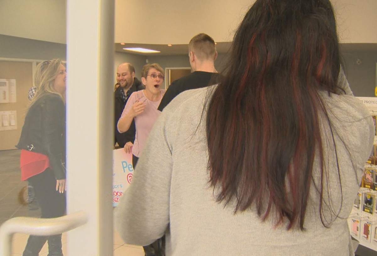 Margaret Johnson looks shocked as the son she hasn\’t seen in more than two years surprises her.