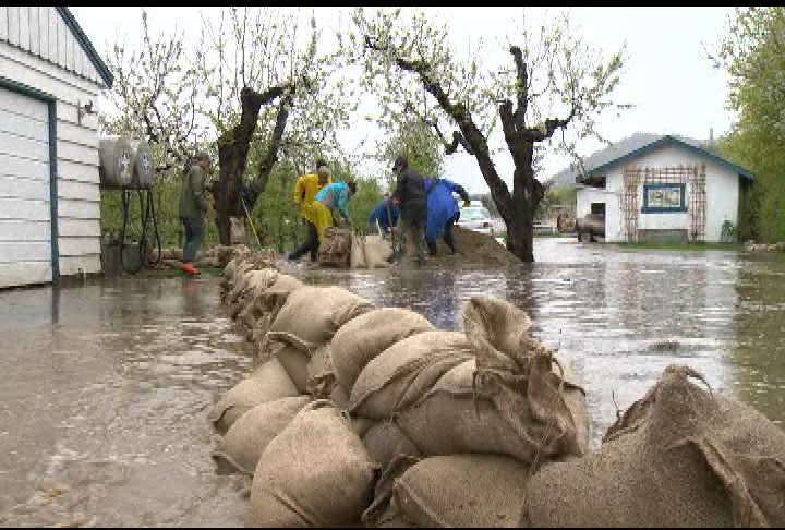 Trying to control flood water in West Kelowna in 2013.