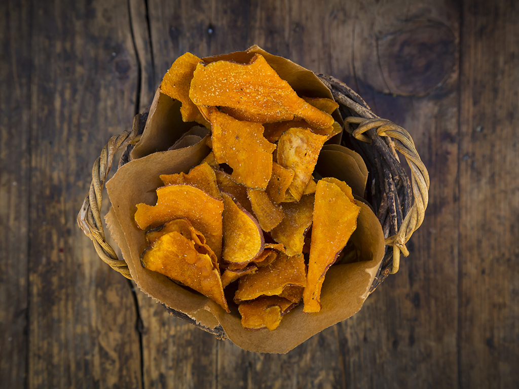Snack foods like these vegan sweet potato chips are perceived as healthier, but experts say that perception comes down to marketing.