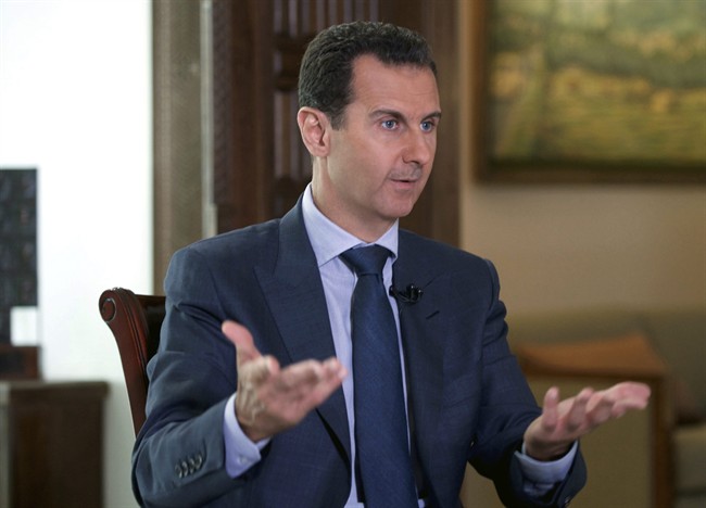 Syrian President Bashar Assad speaks to The Associated Press at the presidential palace in Damascus, Syria. U.S. 