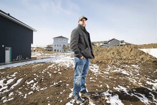 Farid El-Hayouni on Prospect Drive where his old house burned down during the wildfires last year in Fort McMurray, Alta. Friday, April 21, 2017. 
