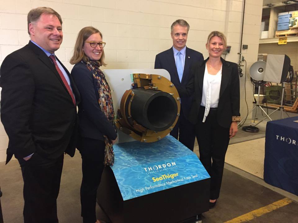 MP Karina Gould stands beside the SeaThigor marine seal that will be tested by the Canadian Coast Guard.