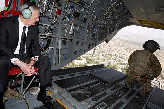 U.S. Defense Secretary Jim Mattis looks out over Kabul as he arrives via helicopter at Resolute Support headquarters in Kabul, Afghanistan Monday, April 24, 2017. U.S. officials are suggesting that Russia is arming the Taliban.