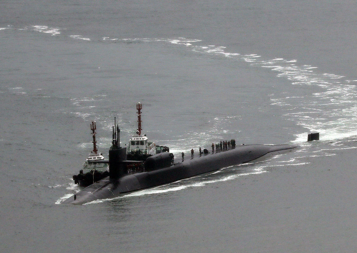 The nuclear-powered submarine USS Michigan approaches a naval base in the southeastern port of Busan, South Korea, 25 April 2017, to join the USS Carl Vinson in drills near the Korean Peninsula amid growing nuclear and missile threats from North Korea.  