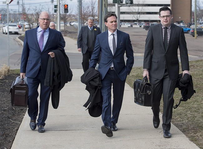 Lawyers for the RCMP to court in Moncton, N.B. on Monday, April 24, 2017. The RCMP's trial on violating four charges of the Canada Labour Code, related to the shooting that claimed the lives of three officers in June 2014, is expected to last two months.