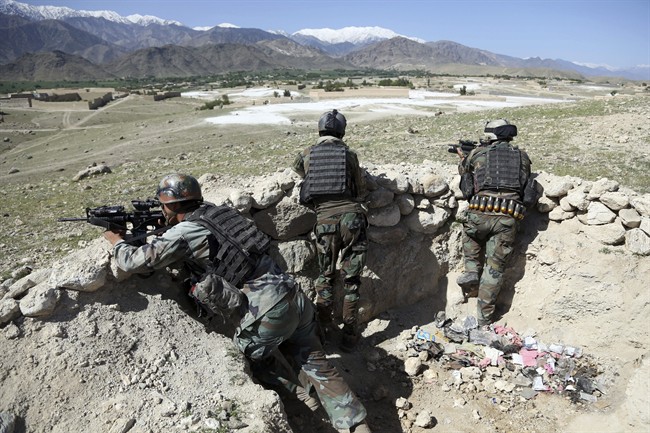 Afghan commandos are positionedcat the Pandola village near the site of a U.S. bombing in the Achin district of Jalalabad, east of Kabul, Afghanistan.
