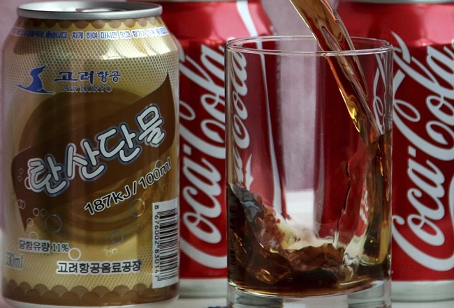 In this Tuesday, April 11, 2017, photo, a can of Air Koryo cola, produced by Air Koryo, the country's flagship airline which recently introduced its own brand of cola on flights to and from Beijing is seen in Pyongyang, North Korea. Coca Cola is possibly the world's most recognizable brand, an almost inescapable symbol of the global appeal of American-style consumer culture. There are only two countries in the world where Coke doesn't officially operate, and one of them is North Korea.