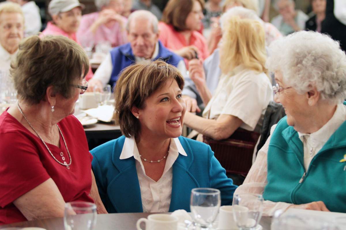 Liberal leader Christy Clark talks to seniors at a Vernon, B.C. seniors centre during a campaign stop on Tuesday, April 24, 2013.