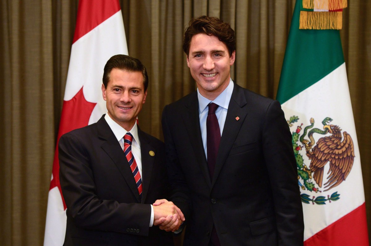 Prime Minister Justin Trudeau meets with Mexican President Enrique Pena Nieto during the APEC Summit in Lima, Peru on Saturday, Nov. 19, 2016.