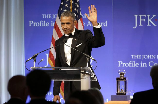 Former President Barack Obama waves at the conclusion of his remarks after being presented with the 2017 Profile in Courage award during ceremonies at the John F. Kennedy Presidential Library and Museum, Sunday, May 7, 2017, in Boston.