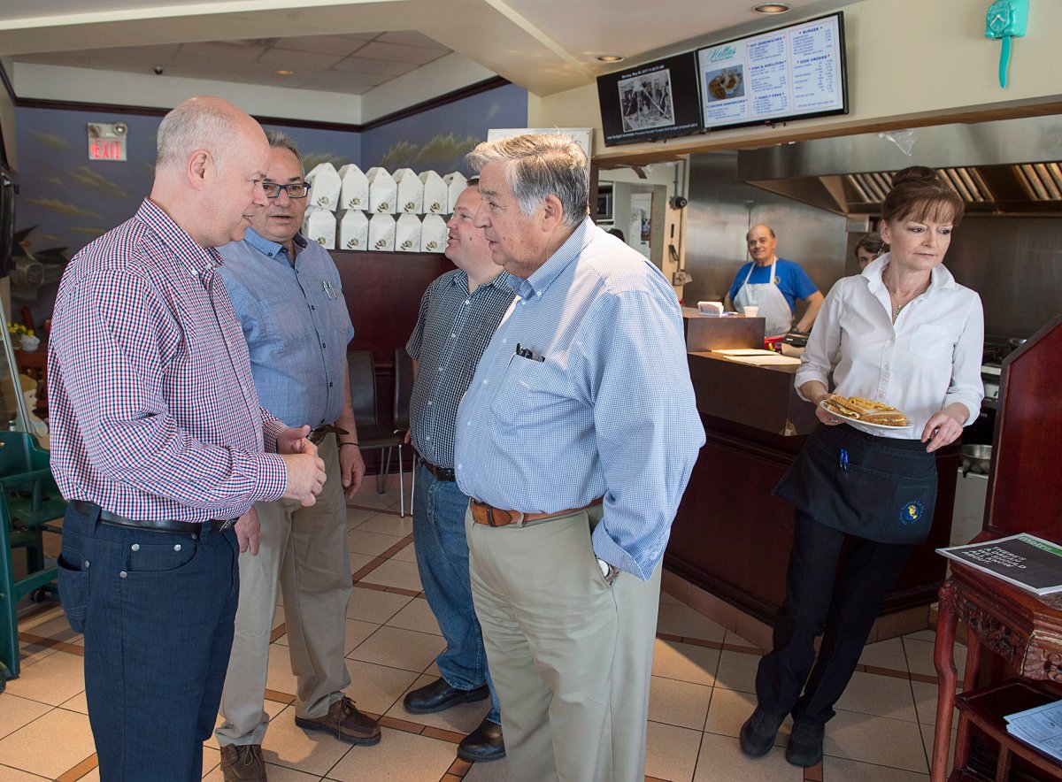 Nova Scotia Progressive Conservative leader Jamie Baillie, left, makes a campaign stop with candidate John Giannakos, second from left, at Hellas Restaurant in Lower Sackville, N.S. on Monday, May 8, 2017.