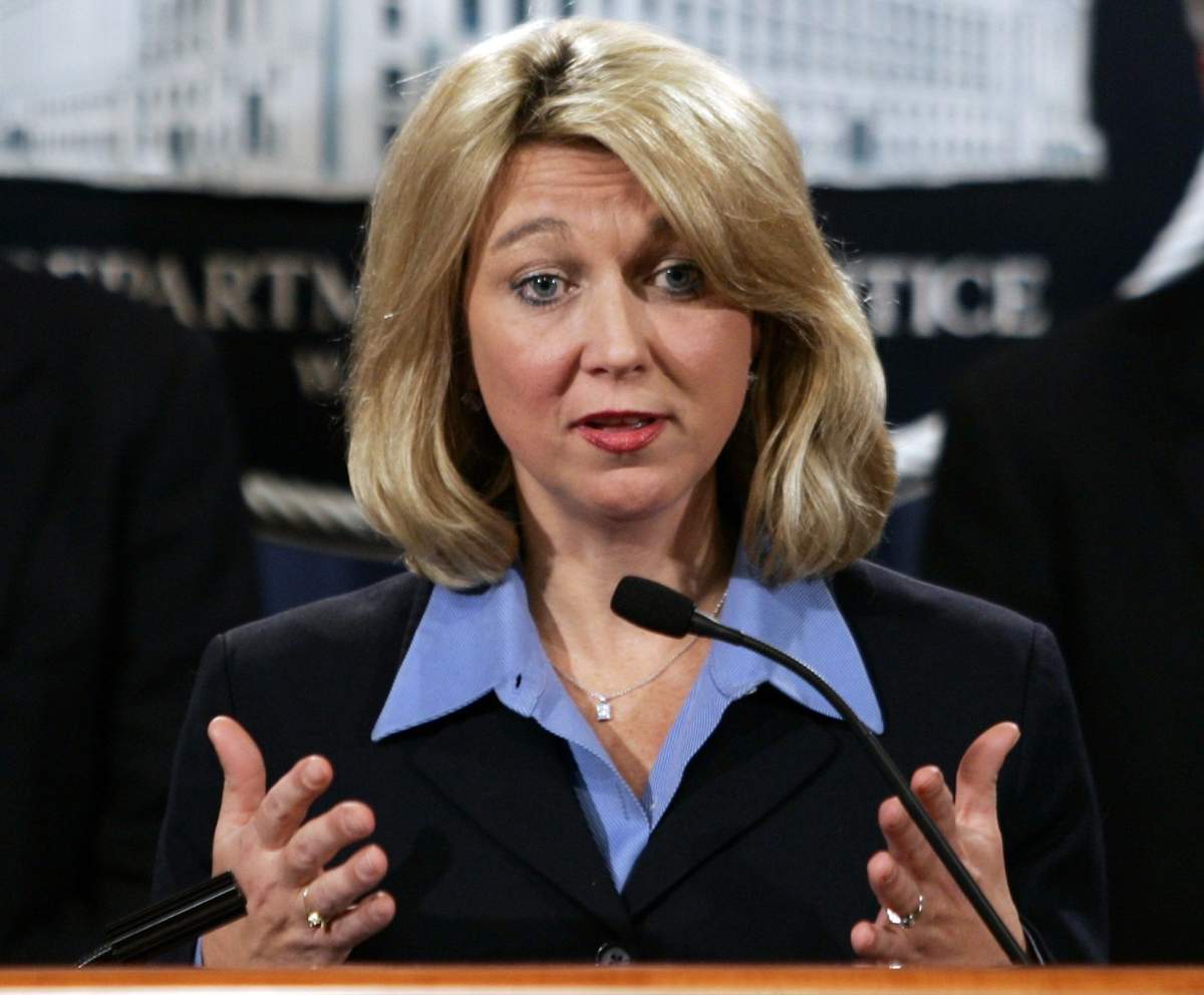 In this Jan. 3, 2006, file photo, then-Assistant Attorney General for the Criminal Division Alice Fisher briefs reporters at the Justice Department in Washington.