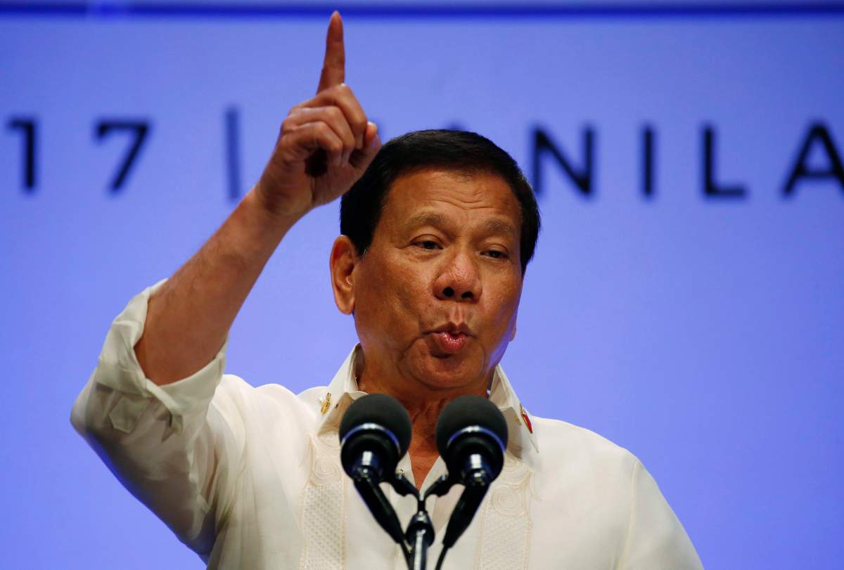 In this April 29, 2017 file photo, Philippines President Rodrigo Duterte gestures while addressing the media following the conclusion of the 30th ASEAN Leaders' Summit in Manila, Philippines. 