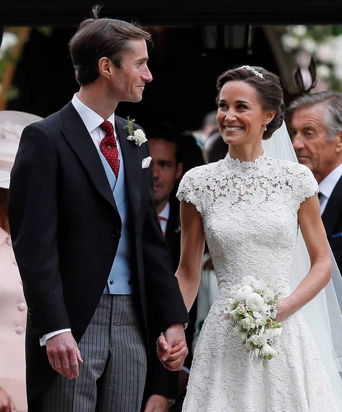 Pippa Middleton and James Matthews smile after their wedding at St Mark's Church in Englefield, England Saturday, May 20, 2017. 