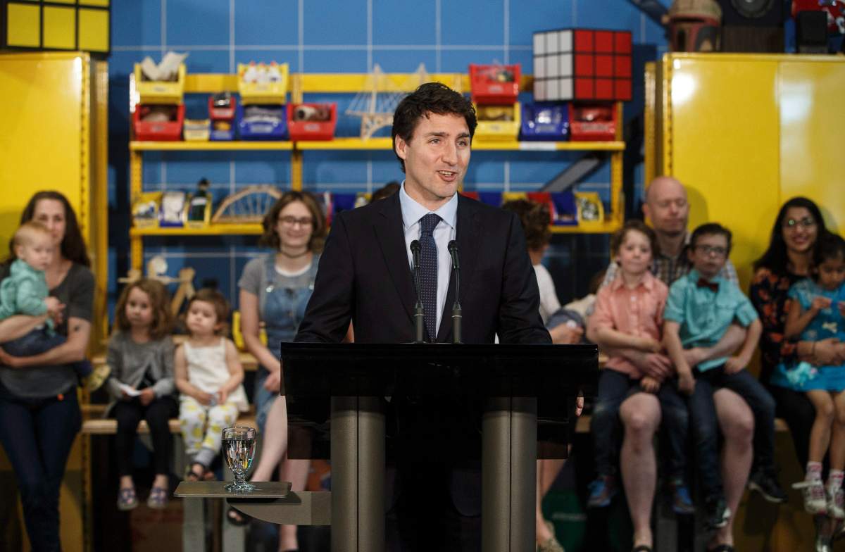 Prime Minster Justin Trudeau speaks with media after visiting with families at the TELUS World of Science to highlight the Canada Child Benefit, in Edmonton on Saturday, May 20, 2017.