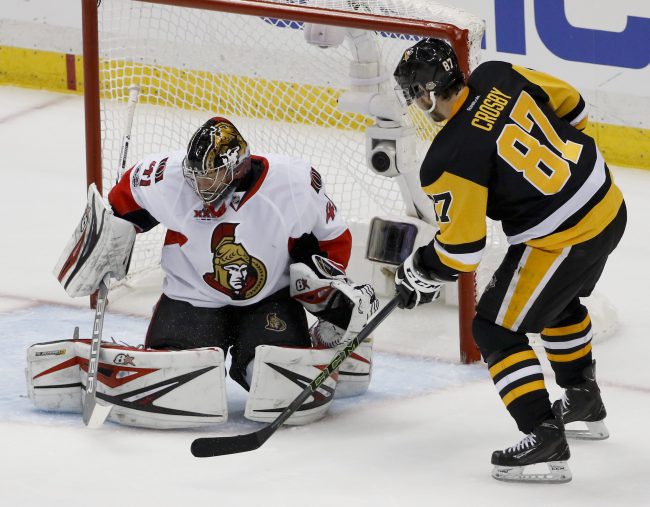 Pittsburgh Penguins' Sidney Crosby scores on Ottawa Senators goalie Craig Anderson during the first period of Game 5 in the NHL hockey Stanley Cup Eastern Conference finals, May 21, 2017, in Pittsburgh.