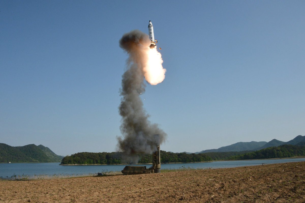 An undated image made available by the North Korean official news agency KCNA on May 22, 2017 shows the test-fire of the ground-to-ground medium-to-long range strategic ballistic missile Pukguksong-2 at an undisclosed location in North Korea. 